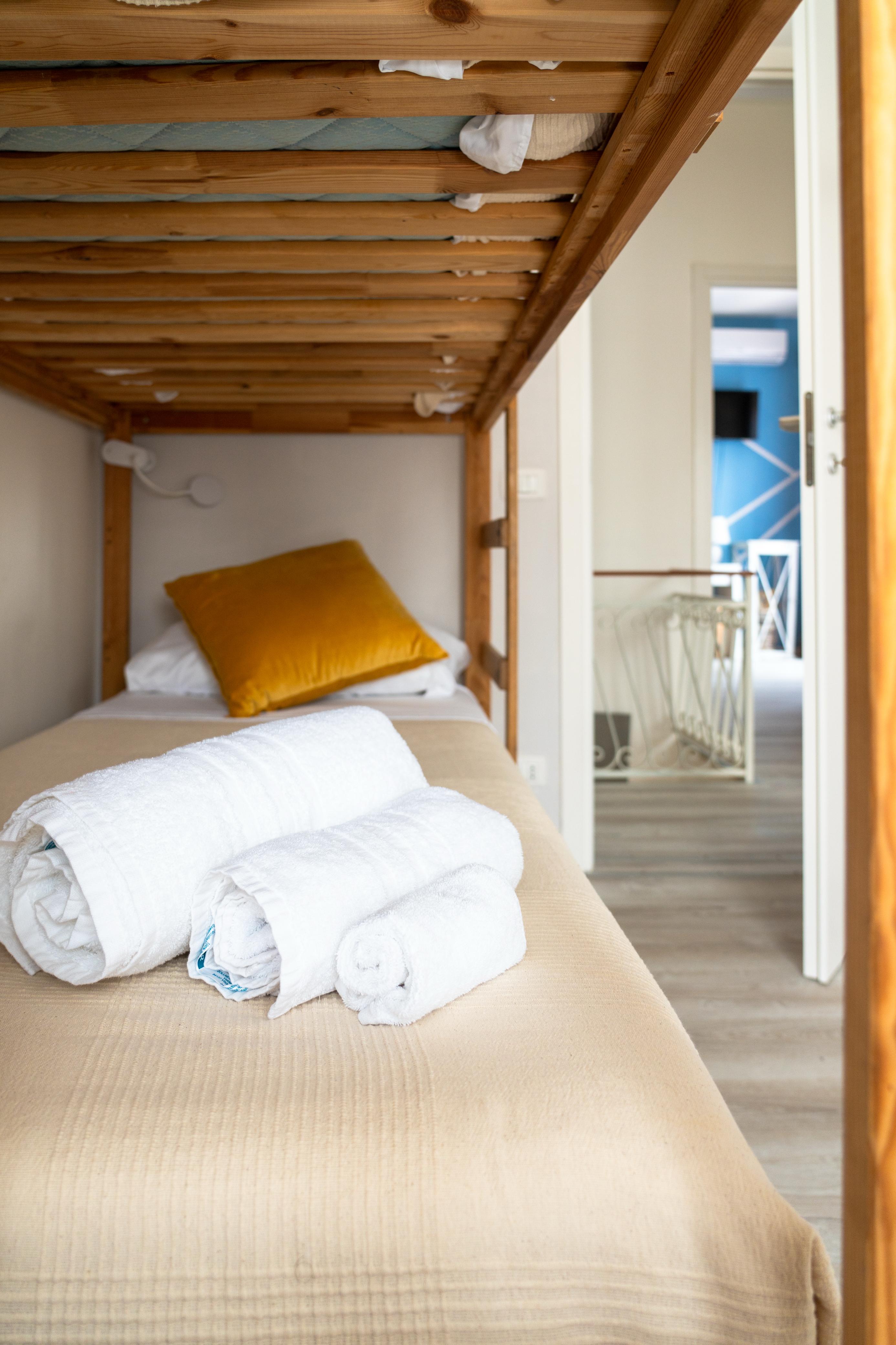 Villa Versilia - Dettaglio letto a castello con cuscini