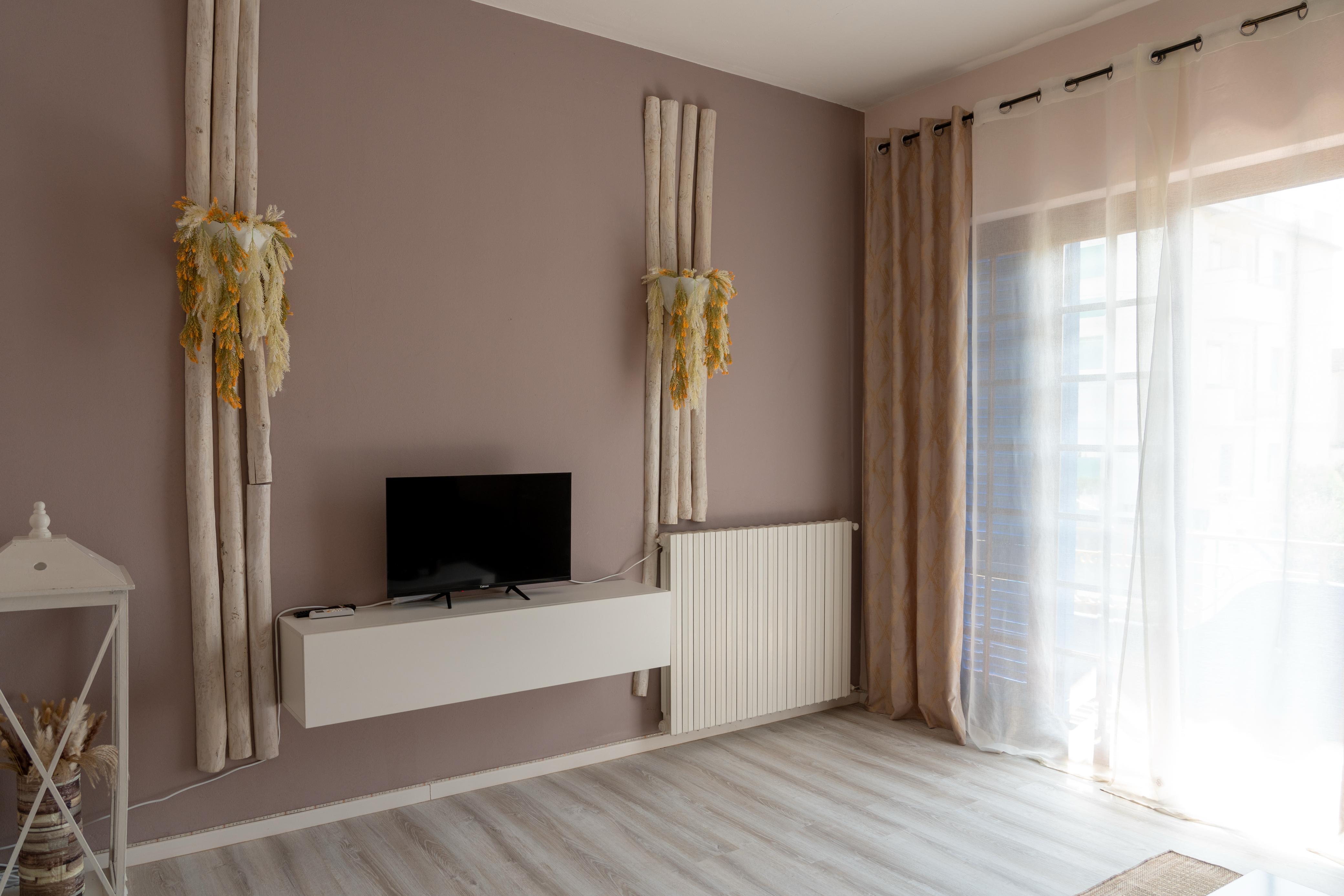 Villa Versilia - Soggiorno TV e decorazioni naturali